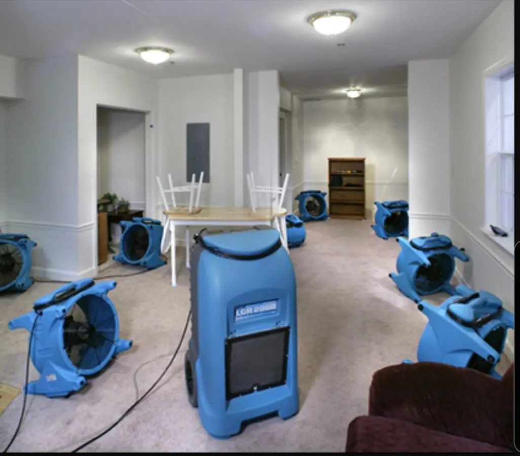 Air movers and dehumidifier setup for Water Damage Restoration in Provo